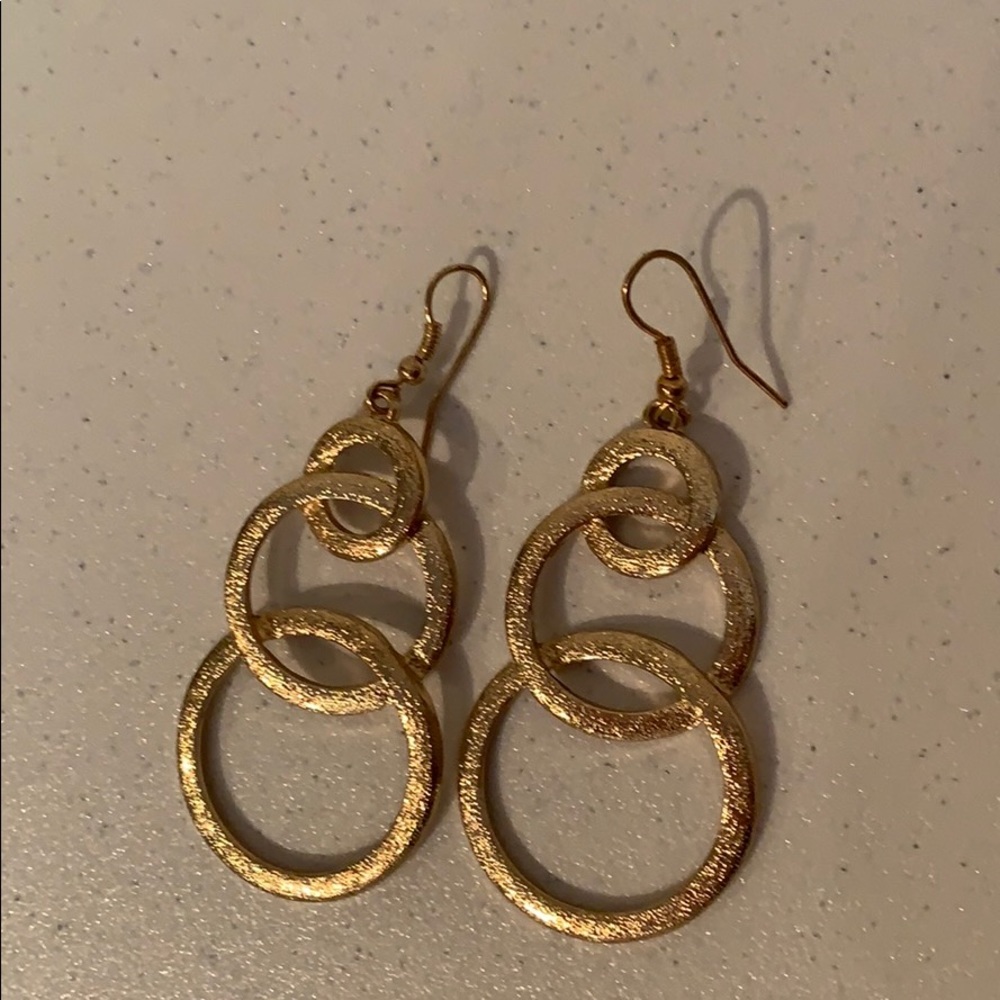 Gold colored earrings